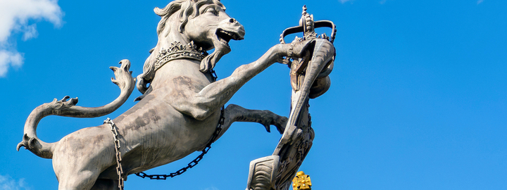 Lead unicorn sculpture on pillar of Trophy Gate 